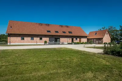 Vacation home among fruit trees up to 32p located between Antwerp&Ghent