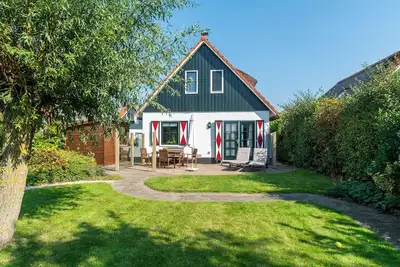 Image de Luxe Vakantievilla aan het Water met Uitzicht op de Duinen van Callantsoog