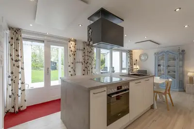 Image de Een Heerlijk Vakantiehuis met een Ruime Tuin op Park Duinland in Sint Maartenszee