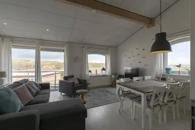 Image de Een Prachtig Appartement dat Zich op Slechts Paar Meter van het Strand