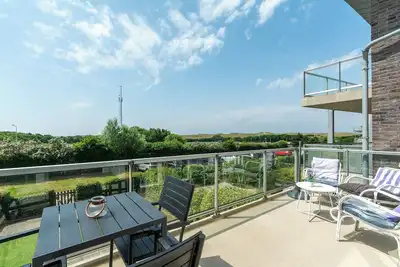 Image de Sfeervol en Modern Ingericht Appartement aan de Voet van de Duinen en het Strand van Groote Keeten