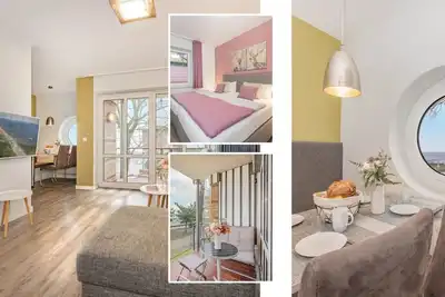 Image de Traumhafte Ferienwohnung 50 m von der SeebrĂĽcke in Koserow, mit Wlan und Balkon - Seeblick Anlage