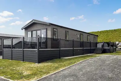 Image de Luxury two bedroom holiday home sleeping four people, perfect for relaxing by the coast.