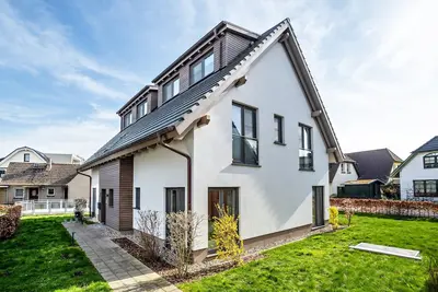 Image de Appartement 'Wohnung Strandperle' avec terrasse privée, jardin privé et Wi-Fi