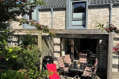 Image de Das Ferienhaus \"An der Mühle\" auf der Nordseeinsel Norderney ist ein