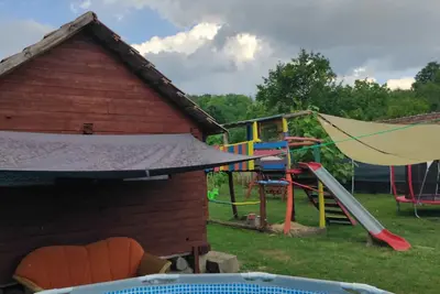 Image de Maison de vacances avec WiFi, bain à remous, sauna infrarouge, piscine et aire de jeux pour enfants