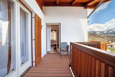 Image de Ferme 'Fröhlichhof Apfelblüte' avec vue sur les montagnes, piscine partagée et Wi-Fi