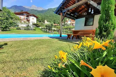 Image de Ferme 'Fröhlichhof Pergola' avec vue sur les montagnes, piscine partagée et Wi-Fi