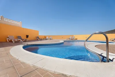 Image de Appartement de vacances 'Roque Del Conde Sunset View' avec vue sur la mer, piscine partagée et Wi-Fi
