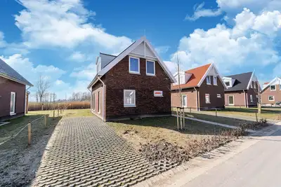 Image de Belle maison de vacances avec sauna près d'un lac