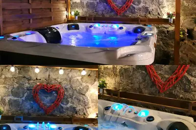 Image de Maison à la campagne avec jacuzzi.