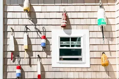 Image de 1940s Fisherman’s Cottage close to beach. Right next to the Water Mill museum.