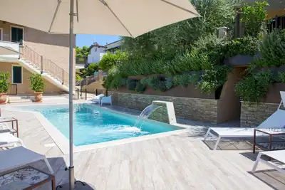 Image de Finely furnished \"Lobster\" Suite 350mt from the sea with Pool, Gymnasium, WiFi
