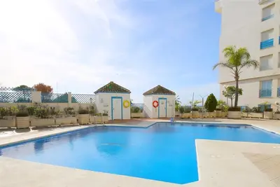 Image de Appartement moderne avec WiFi, Clima et Piscine, Proche de la plage, restaurants, port et centre