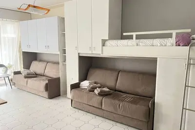 Image de Studio apartment of 35 meters in the luxury residence with janitor facing the beach.