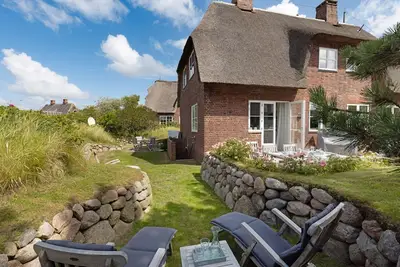 Image de Herzlich Willkommen im Ferienhaus Fredderiks Hus