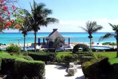 Image de Oceanfront Oasis 3-Bedroom Oceanfront Condo at Xaman Ha, Playa del Carmen