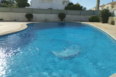 Image de T2 Golfinho, com terraço, Bbq, wifi e piscina