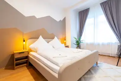 Image de Stadtnatur Apartment Direkt am Küchwald mit Balkon und Arbeitsplatz!