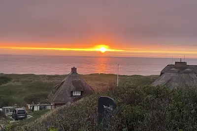 Image de Reetdachhaus mit Traumblick in Hörnum auf das Meer und Strand