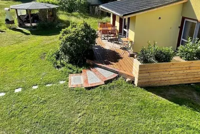 Image de Vacation apartment at Düstersee with terrace and sauna in your own garden