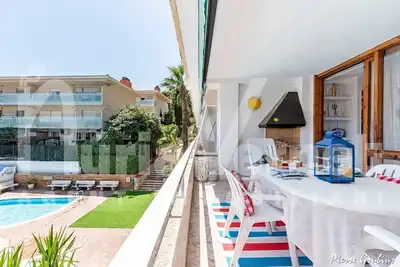 Image de Estupendo apartamento con barbacoa y piscina