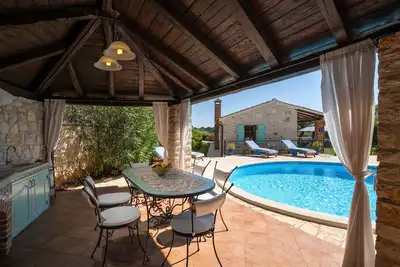 Image de Recharge your soul at this romantic stone villa with pool, garden & sunset view