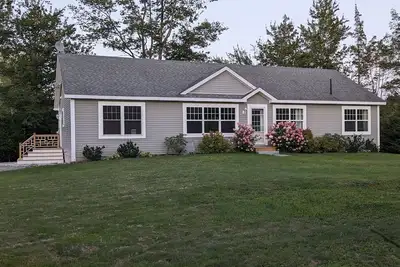 Image de New! A Secluded House in the Woods with a short walk to the Beach!