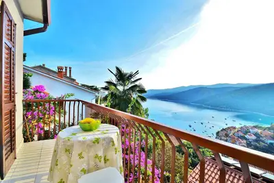 Image de Appartement de vacances avec climatisation et vue sur la mer