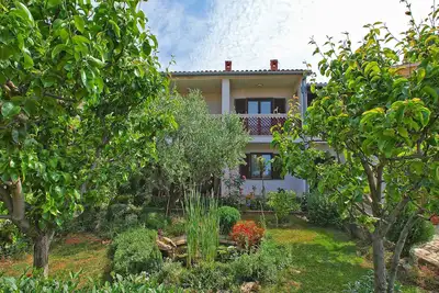 Image de Appartement de vacances avec jardin et barbecue