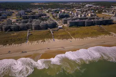 Image de Charming 2-bedroom resort across the street from the ocean in Kill Devil Hills.