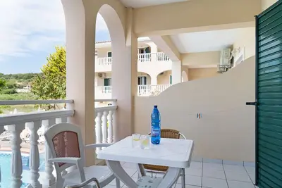 Image de Appartement 'Sandy Maria Studio 604' avec piscine partagée, Wi-Fi et climatisation