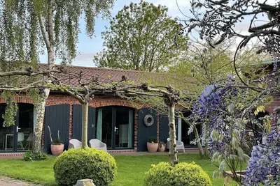 Image de Appartement \"Vier\" au Hof Himmelgrün avec grand jardin