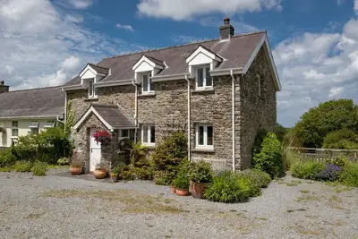 Image de Stable Cottage, character holiday cottage, with open fire in New Quay