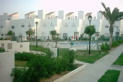 Image de With private garden, private balcony and private roof terrace facing the pool