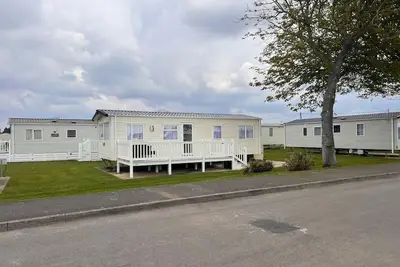 Image de Cosy caravan on Hoburn Naish 5 star complex. Leisure pub entertainment on site.