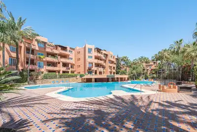 Image de Stunning 3-bedroom apartment with fantastic pool views in Oasis de Marbella