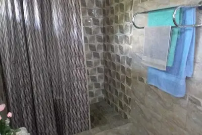 Image de Cozy 3-bedroom townhome in enjoyable Piarco with Ac, WiFi