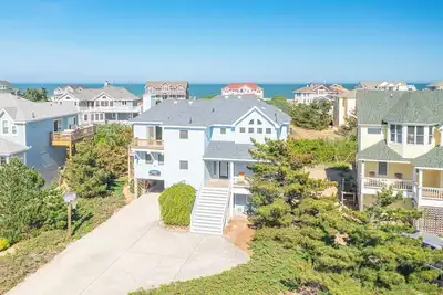 Image de Oceanside vacation rental steps away from the beach access in Corolla, Nc!