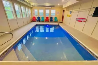 Image de InCabinHeatedPool-Jacuzzi-KingBeds- Ev Charger - Sleeps20 Aracade Ev3