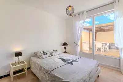 Image de Appartement pour 6 personnes avec terrasse partagée, climatisation et Wi-Fi