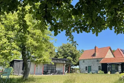Image de Maison de vacances 'Atelierhaus Auf Hofjumne' avec terrasse privée, jardin privé et Wi-Fi