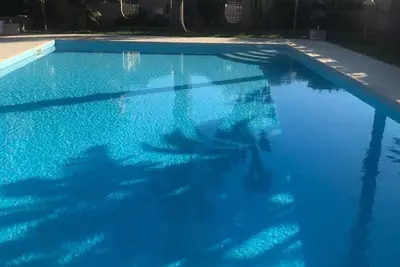 Image de Entire Apartment in Villa with Pool facing the Beach