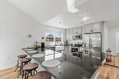 Image de Blueberry Cottage is superbly located in Mena. Wifi, All New, Just Remodeled