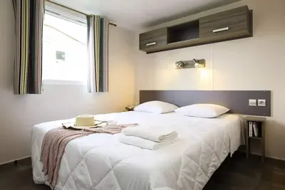 Image de Mobil-home Confort 28m² - 2 chambres - terrasse semi-couverte - Tv + lave-vaisselle 5 personnes