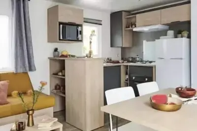 Image de Mobil Home Premium - 32m² - Climatisation - 2 chambres - terrasse couverte - 4 à 5 personnes - 4 pers. inclus dans le tarif
