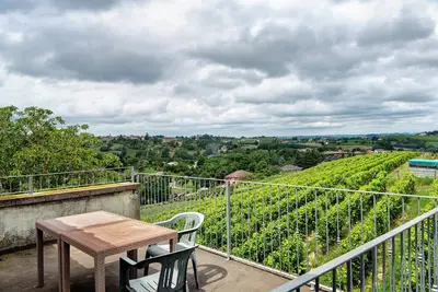 Image de Appartement 'Barbera' avec vue sur les montagnes, piscine partagée et Wi-Fi