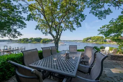 Image de Renovated waterfront home with dock and private beach