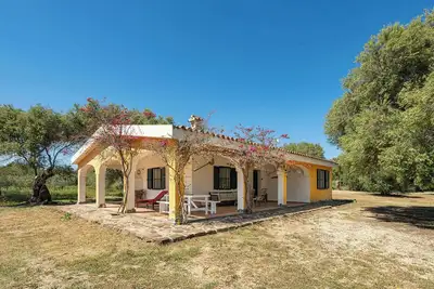 Image de Villa avec climatisation et jardin