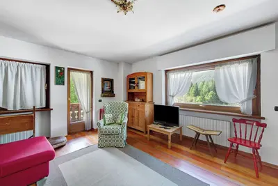 Image de Appartement 'Appartamento Serdes Big C2' avec vue sur les montagnes et balcon